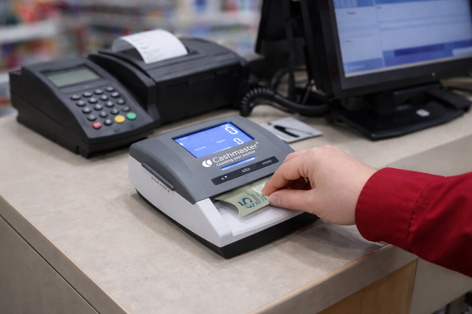 Cashier_using_GenuOne_at_register